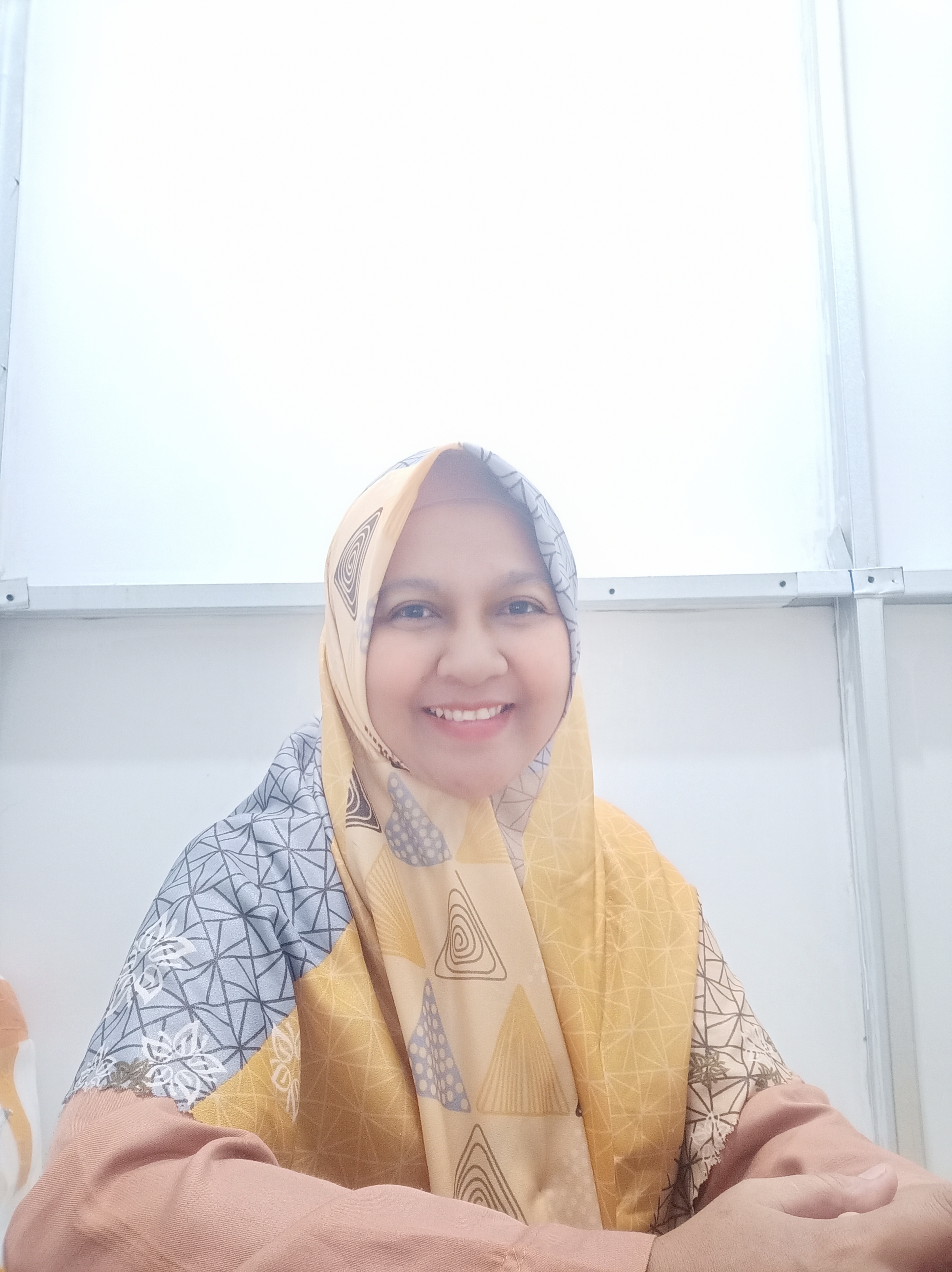 Suwarti, S. Kom, M. Kom